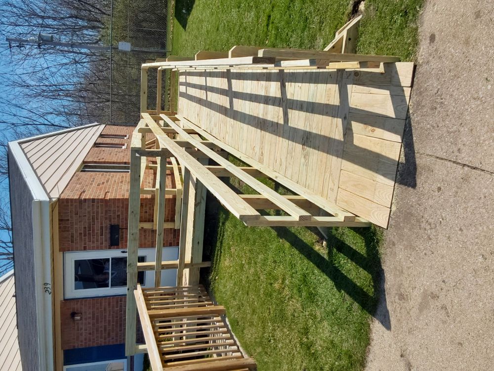 A newly built ramp leading up to a house. 